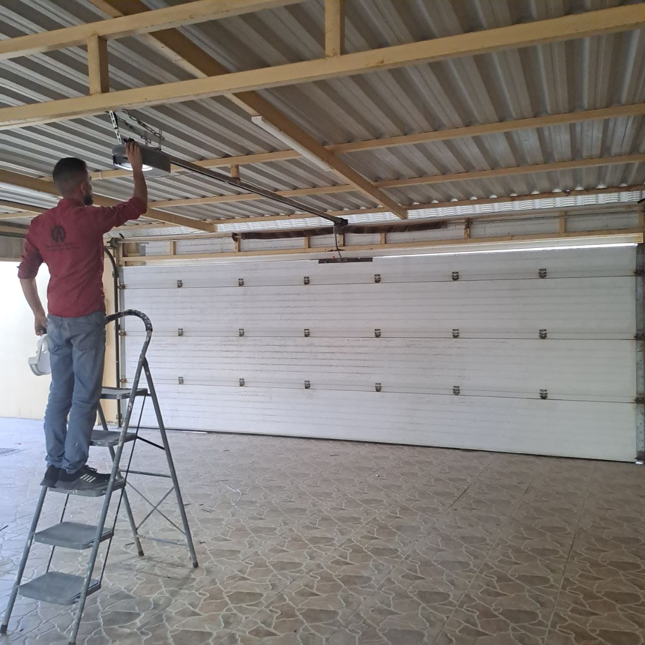 أبواب السيكشنال أوفر هيد <i class='fa fa-long-arrow-left color'></i>